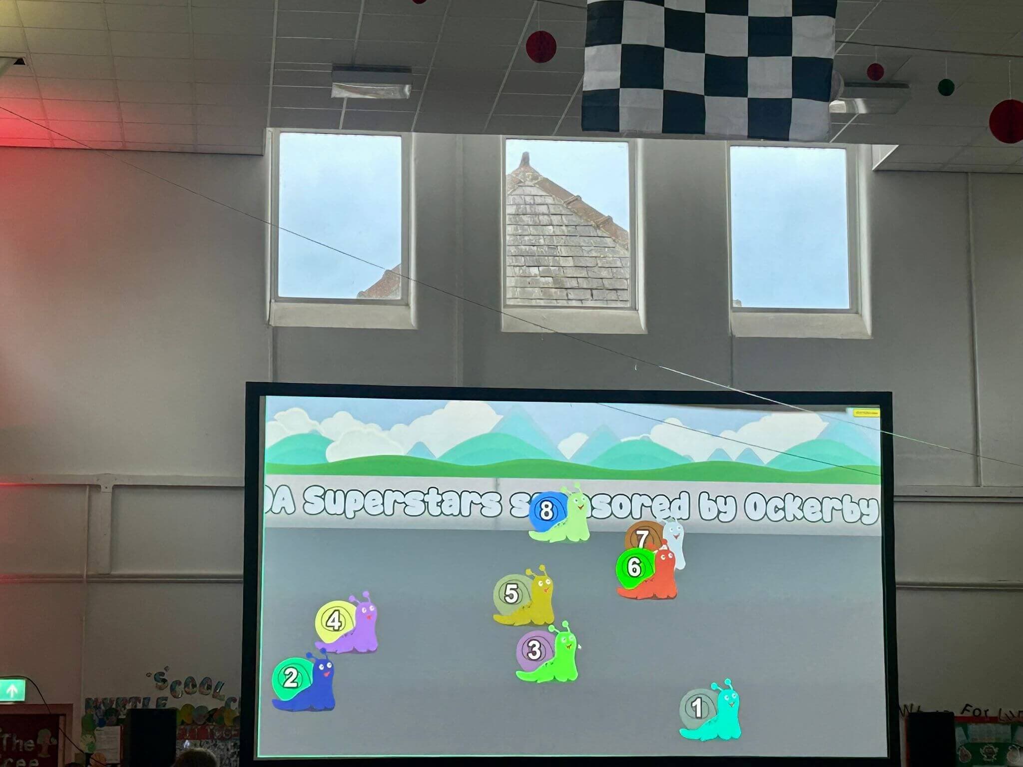 Screenshot of a Creature Dash race on the projector